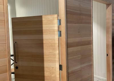 Wooden wall and door built by Coastal Woodcraft